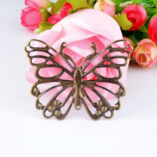 Butterfly metal embellishment from AliExpress for mixed media art projects, where to buy mixed media art supplies, mixed media embellishments from AliExpress